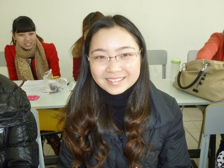 Chinese university student sitting in classroom