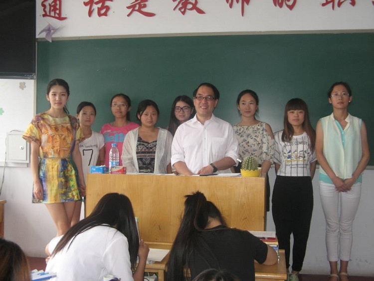 Teacher Kim teaching subjects in China.