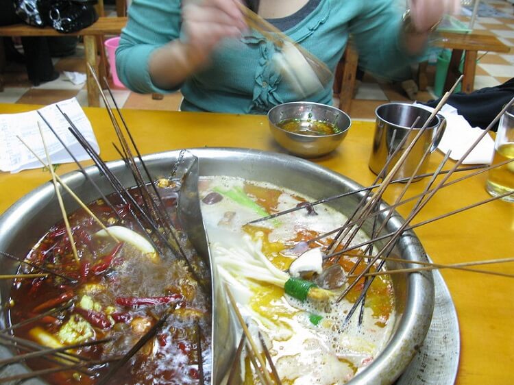 Eating spicy hotpot in China